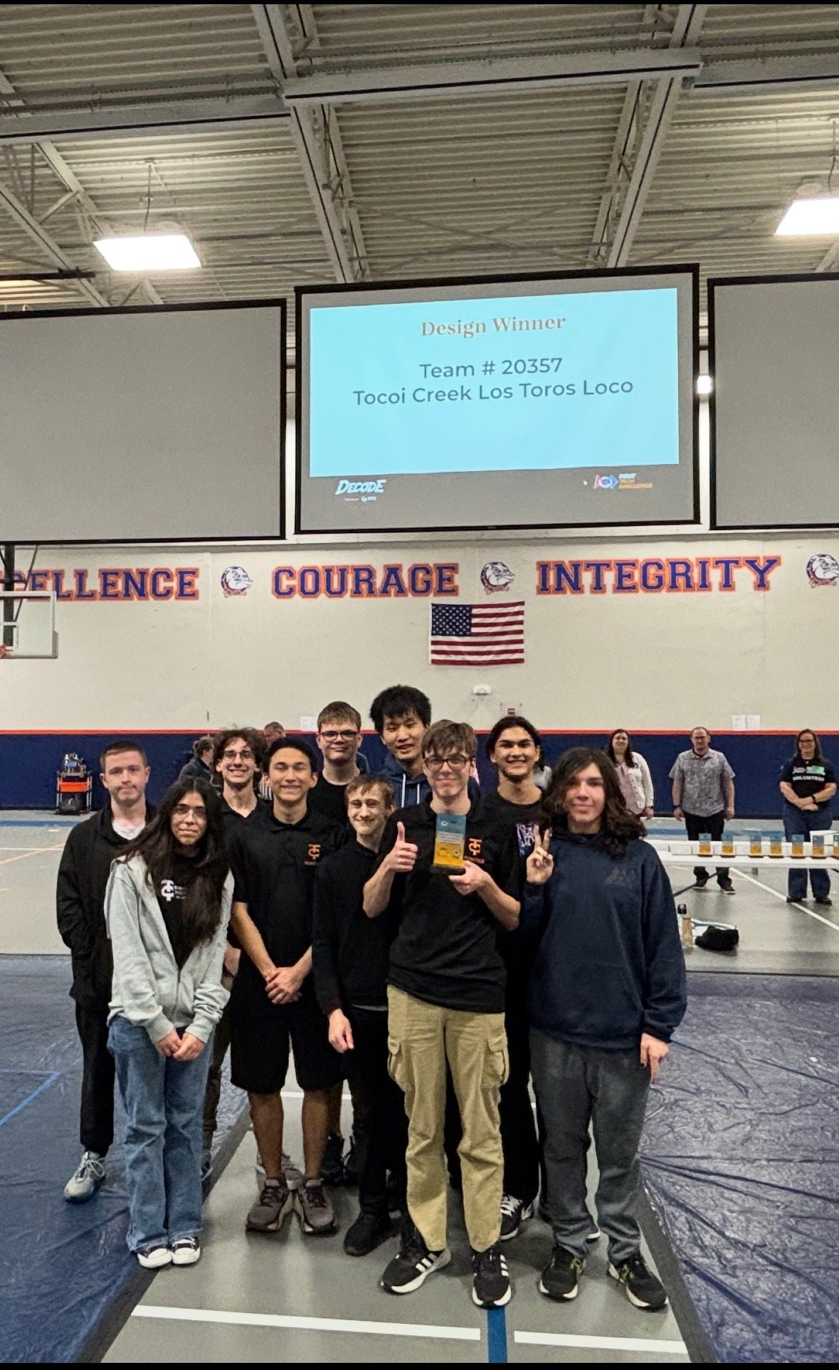 Team 20357 celebrating a Design Award at a league tournament